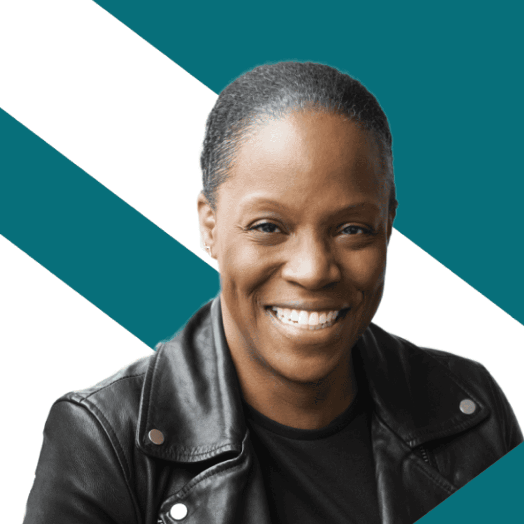 Tamara Chanoine, Marketing Operations Manager at Futurpreneur Canada, smiling, wearing a black leather jacket and a black round neck shirt.