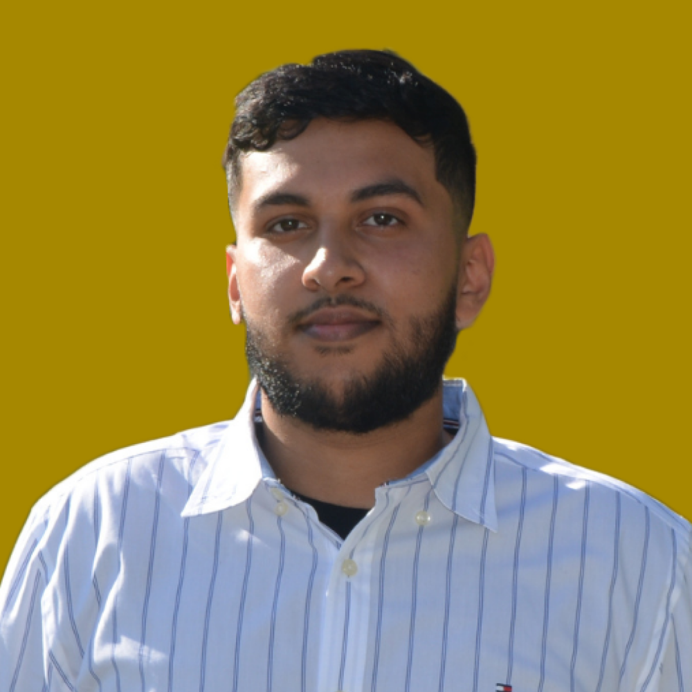 Zohayr Khan, Web Developer at B4brand, wearing a blue and white striped shirt.