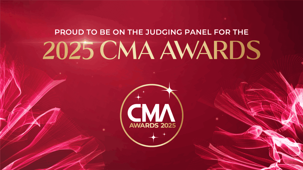 Promotional image with a red background and dynamic pink wave graphics, announcing: “Proud to be on the judging panel for the 2025 CMA Awards.” The CMA Awards 2025 logo appears in the center within a gold circle surrounded by sparkles.